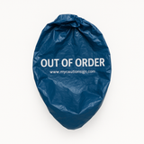 A blue plastic toilet cover with the text 'OUT OF ORDER' printed in white. The cover is designed to fit over a standard-size toilet.