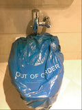 Out of Order Cover on Hotel Toilet in Bathroom